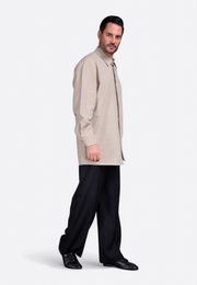 Model wearing beige linen men's shirt by East Vibe